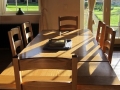 The Dairymaid's dining table in the sitting room
